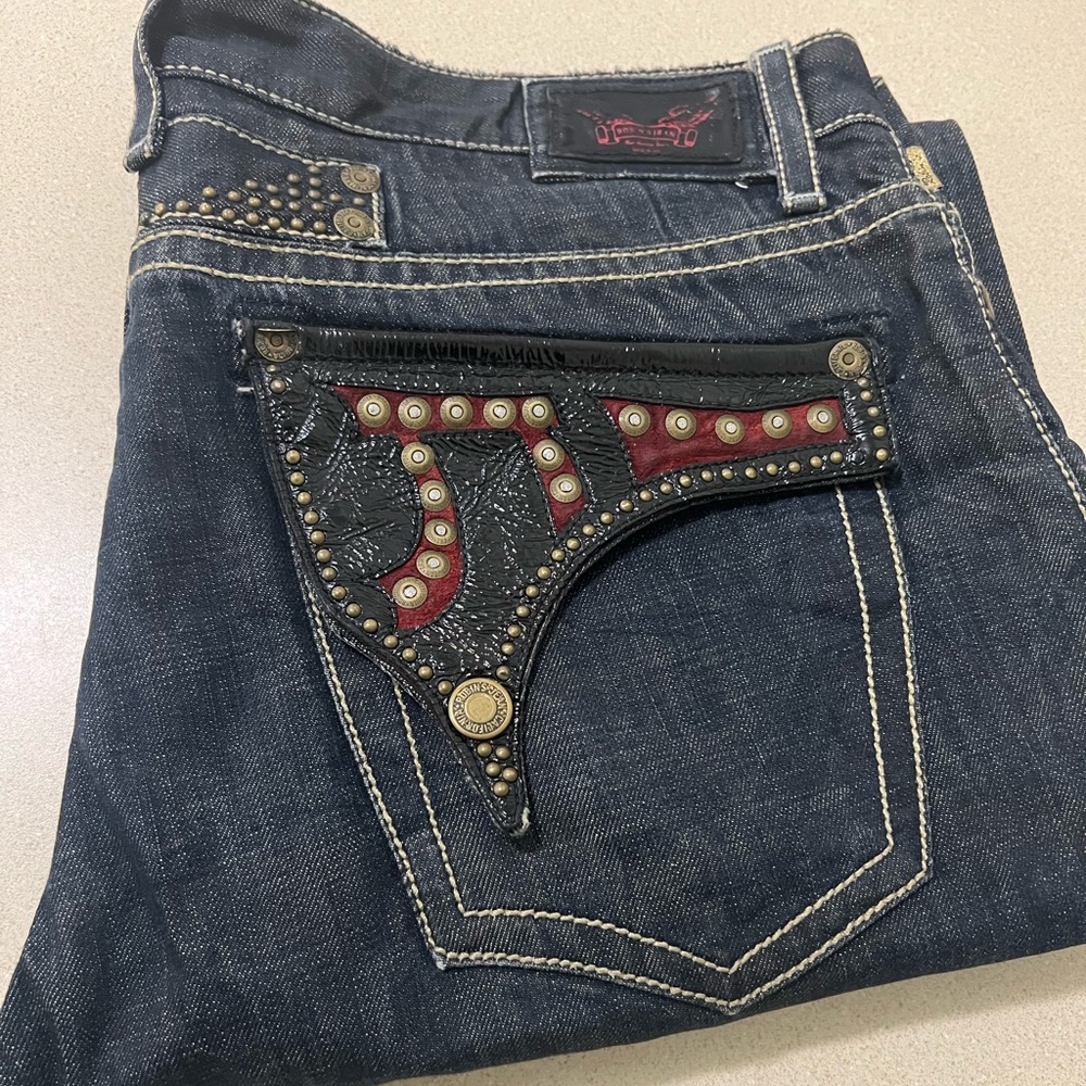 Rockstar celebrity Robin's Jean Dark Blue Jeans with Red and Black Accents